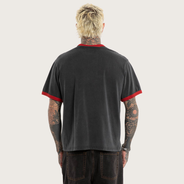 Model wears Inferno Rocker Tee Mineral Black T-Shirts in Black - Image 3