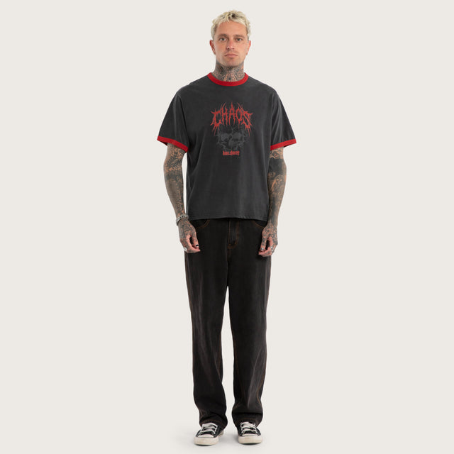 Model wears Inferno Rocker Tee Mineral Black T-Shirts in Black - Image 5