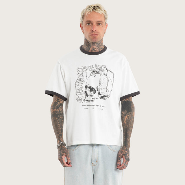 Model wears Disorder Rocker Tee Natural White T-Shirts in White - Image 1