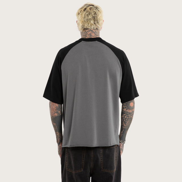 Model wears Static Chaos Raglan Street Tee Grey T-Shirts in Grey - Image 3