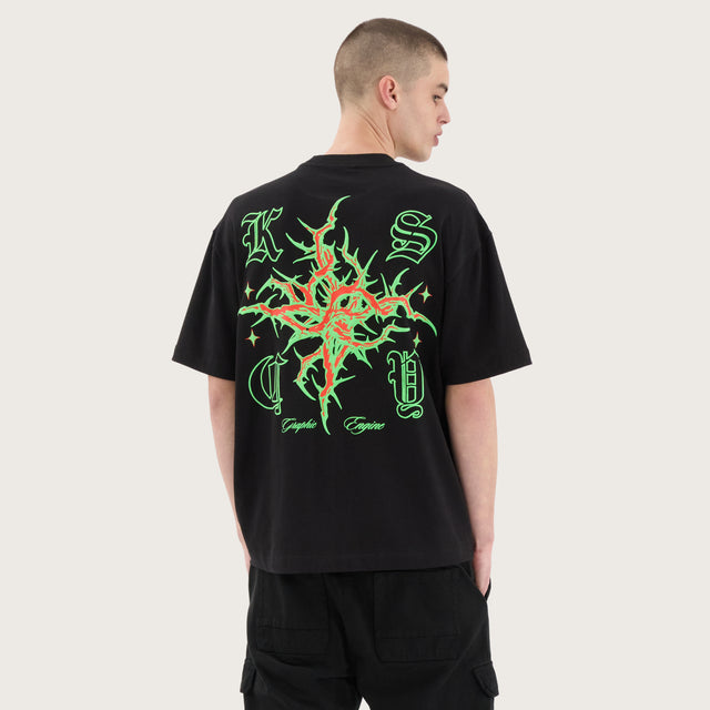 Model wears Thorn Street Tee Jet Black T-Shirts in Black - Image 6