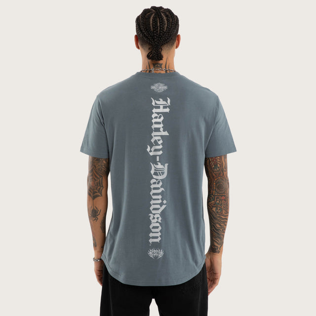 Model wears Rustline Dual Curved Tee Stormy Weather T-Shirts Blue – image 1