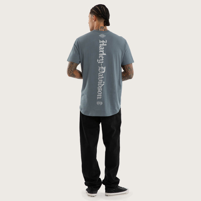 Model wears Rustline Dual Curved Tee Stormy Weather T-Shirts Blue – image 4