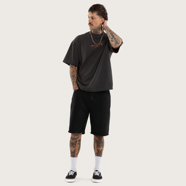 Model wears Pursuit Street Tee Pigment Black T-Shirts Black – image 3