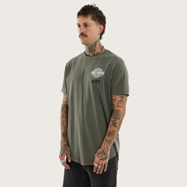Model wears Michigan Dual Curved Tee Pigment Basil T-Shirts Green – image 3
