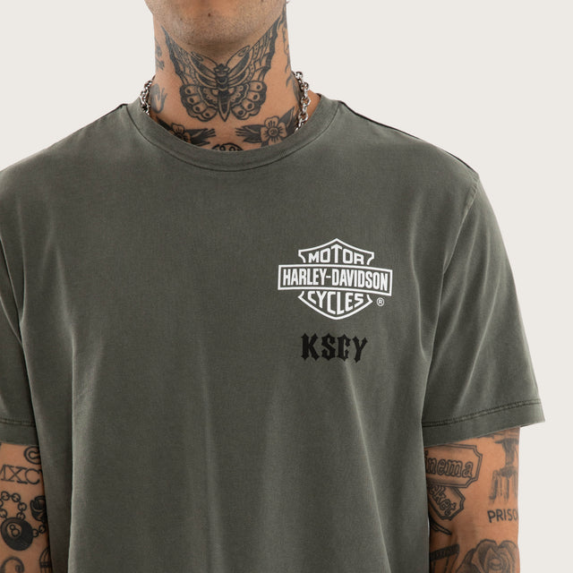 Model wears Michigan Dual Curved Tee Pigment Basil T-Shirts Green – image 6
