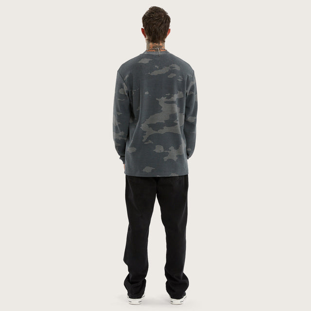 Model wears Touring Longsleeve Mini Waffle Tee Camo Longsleeve T-Shirts Camo – image 9