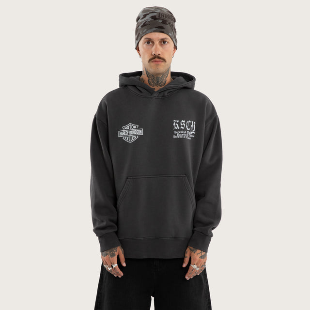 Model wears Cycles Relaxed Hoodie Pigment Jet Black Hoodies Black – image 4