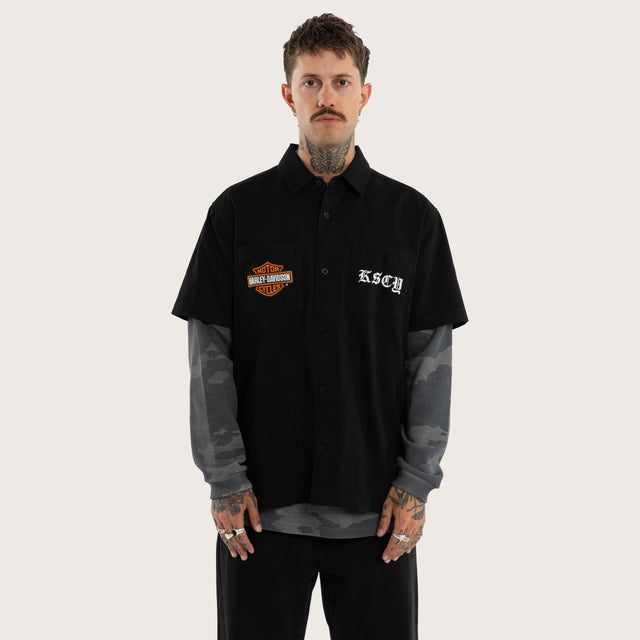 Model wears Customs Short Sleeve Mechanic Shirt Jet Black Short Sleeve Shirts Black – image 2