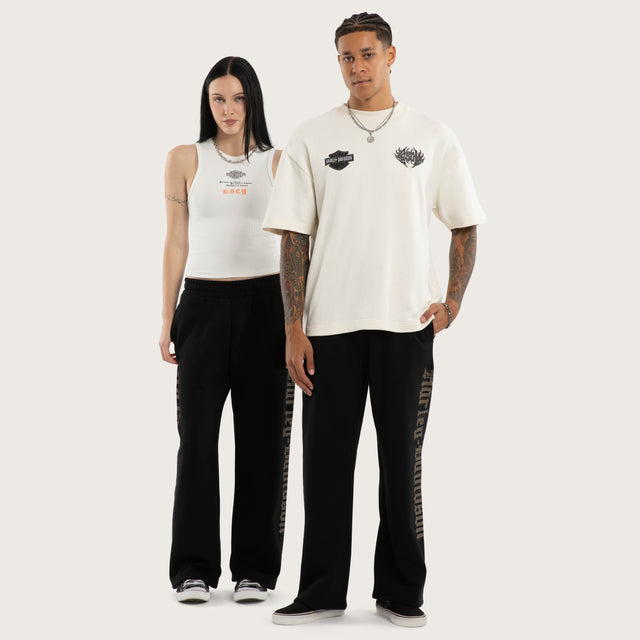 Model wears Twin Razor Trackpant Jet Black Trackpants Black – image 2