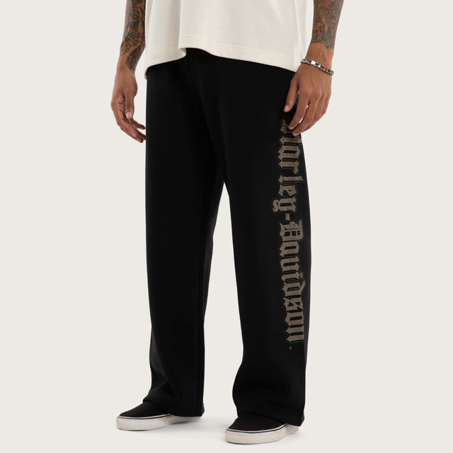 Model wears Twin Razor Trackpant Jet Black Trackpants Black – image 1