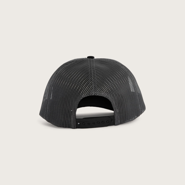 Model wears Hog Trucker Cap Charcoal/Black Caps Grey – image 4