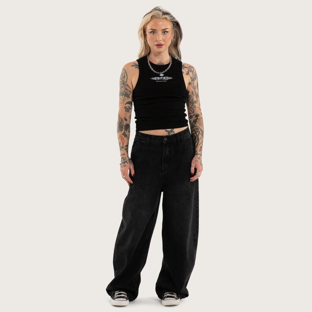 Model wears Torque Rib Tank Top Jet Black Singlet in Black - Image 5