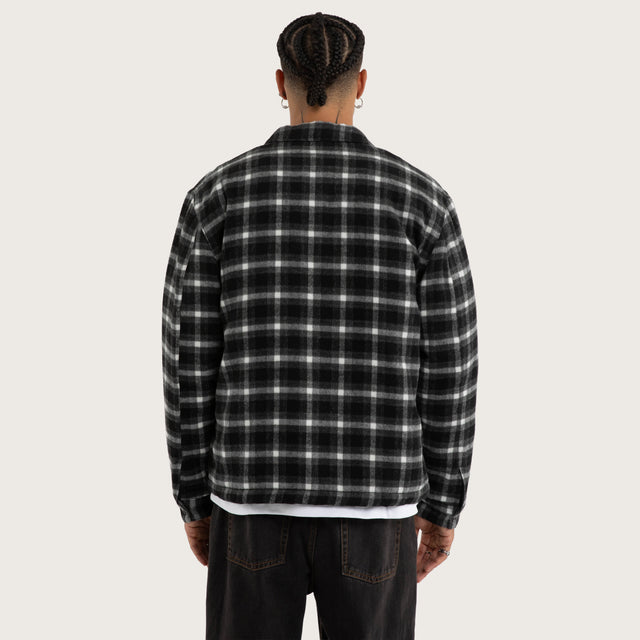 Model wears Future Relaxed Overshirt Grey Check Long Sleeve Shirts in Grey - Image 3