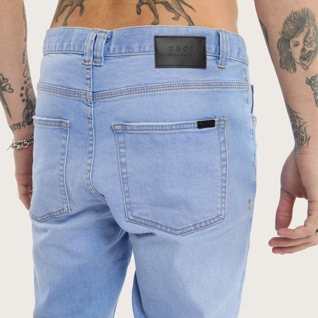 Model wears K1 Super Skinny Fit Jeans Ultimate Blue Pants in Blue - Image 4