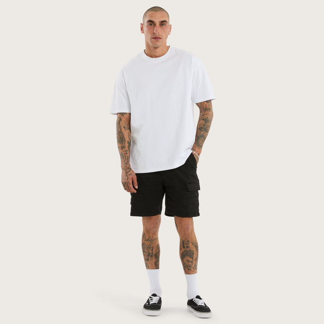 Model wears Salem Cargo Short Obsidian Black Shorts in Black - Image 2