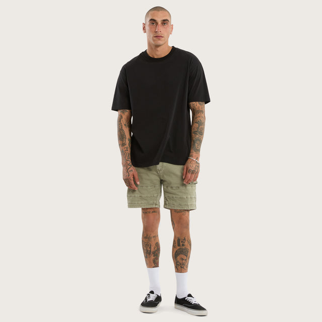 Model wears Salem Cargo Short Vintage Khaki Shorts in Green - Image 2