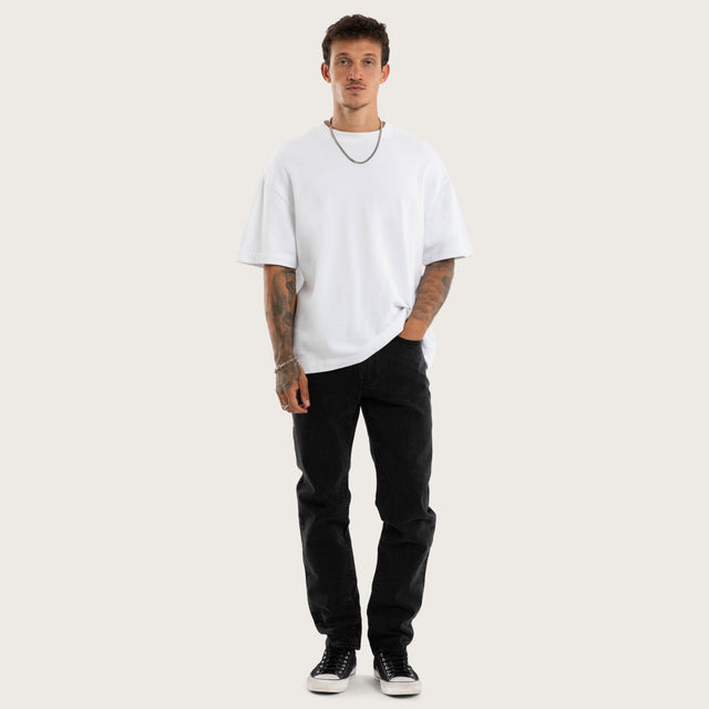Model wears K3 Slim Jean Jet Black Pants Black – image 8