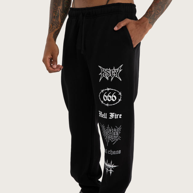 Model wears Cobalt Straight Trackpant Jet Black Trackpants in Black - Image 4