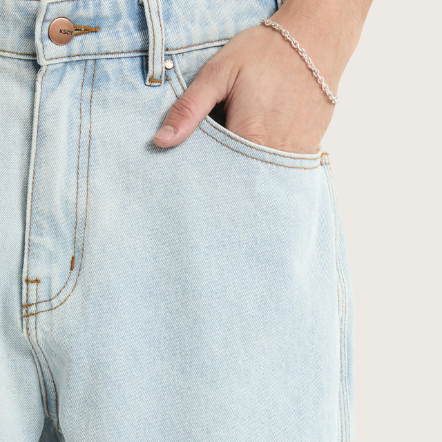 Model wears K6 Baggy Wide Leg Jean Light Blue Pants in Blue - Image 7