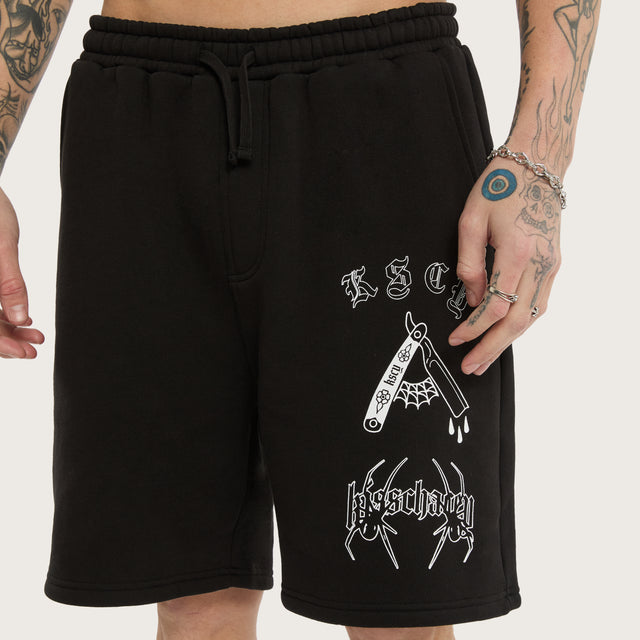 Model wears Close Shave Trackshort Jet Black Trackshorts in Black - Image 5