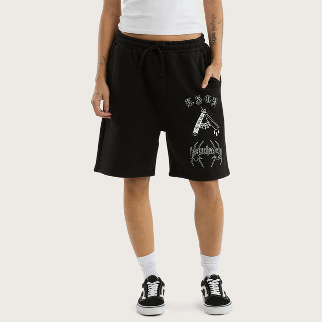 Model wears Close Shave Trackshort Jet Black Trackshorts in Black - Image 7