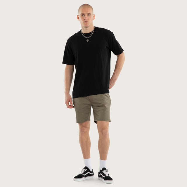 Model wears Wyvern Short Dune Shorts Brown – image 2