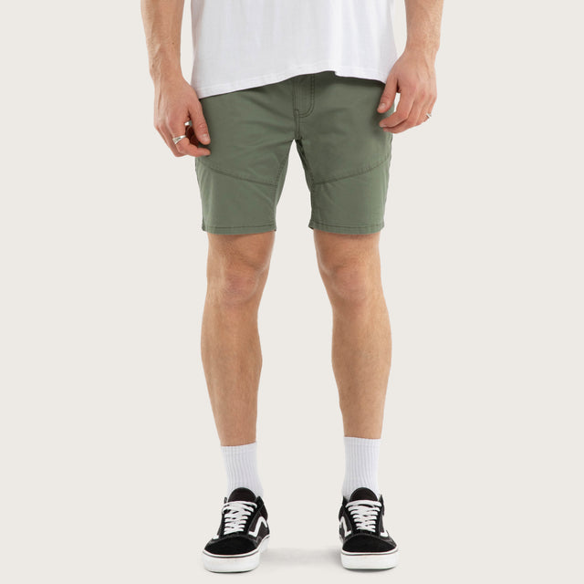 Model wears Wyvern Short Khaki Shorts Green – image 1