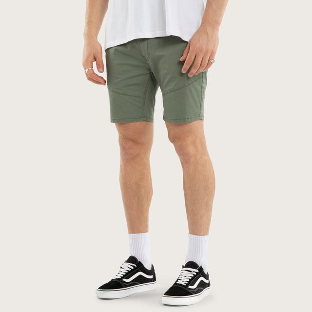 Model wears Wyvern Short Khaki Shorts Green – image 3