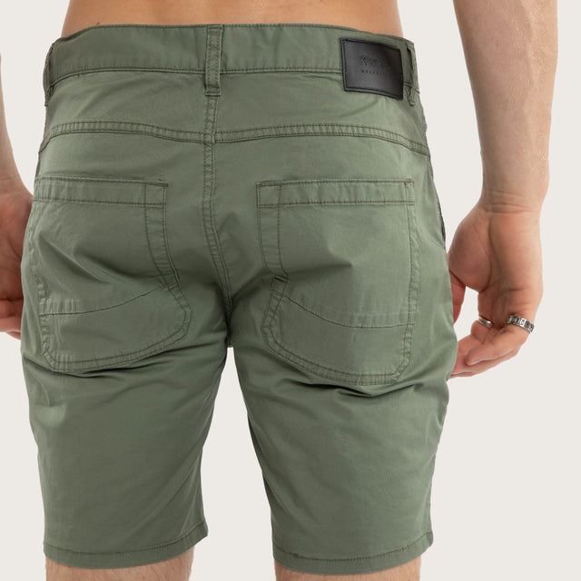 Model wears Wyvern Short Khaki Shorts Green – image 6