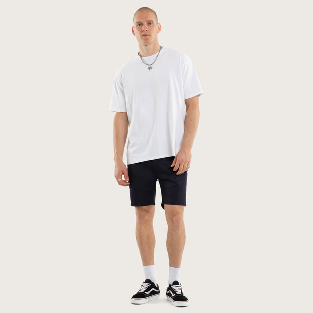 Model wears Wyvern Short Navy Shorts Blue – image 2
