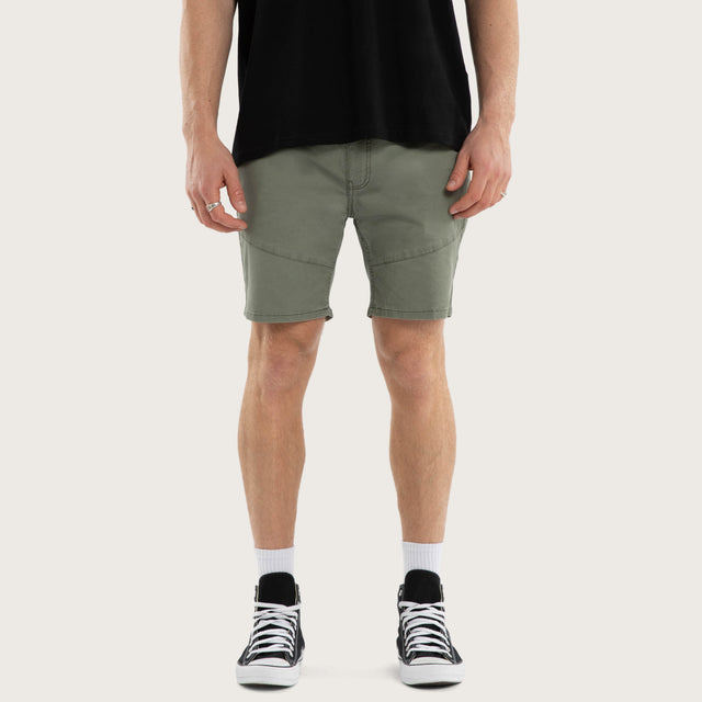 Model wears Wyvern Short Oil Green Shorts Green – image 1