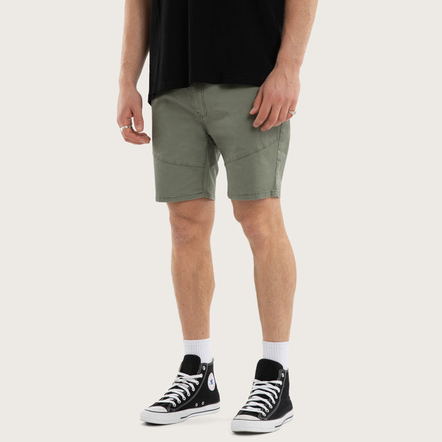 Model wears Wyvern Short Oil Green Shorts Green – image 3
