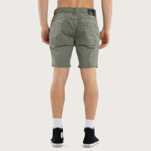 Model wears Wyvern Short Oil Green Shorts Green – image 5