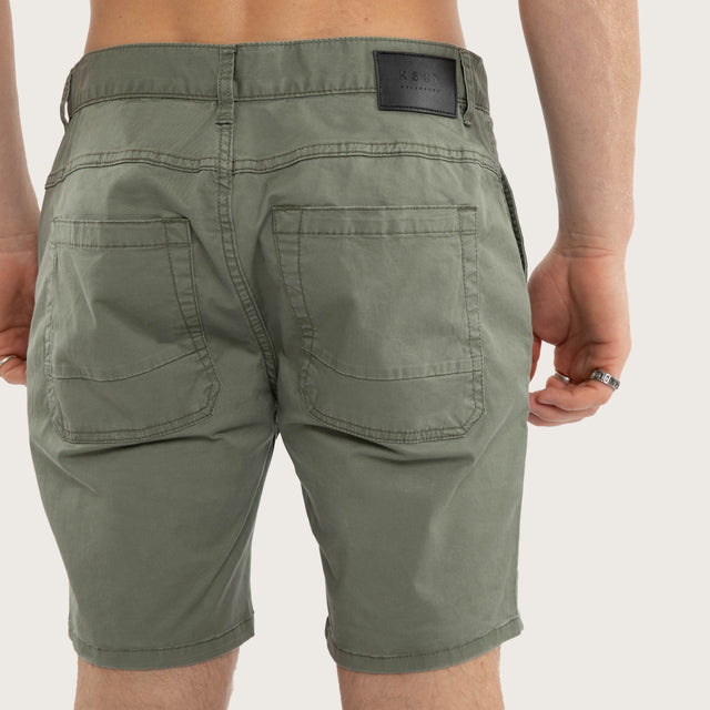 Model wears Wyvern Short Oil Green Shorts Green – image 6