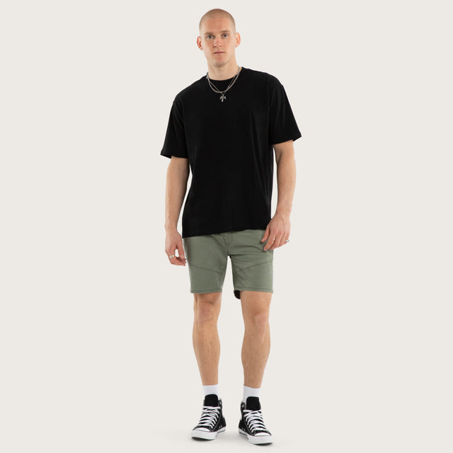 Model wears Wyvern Short Olive Shorts Green – image 2