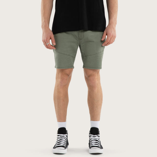 Model wears Wyvern Short Olive Shorts Green – image 1