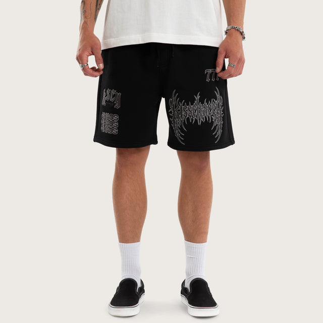 Model wears Threshold Trackshort Jet Black Trackshorts Black – image 1