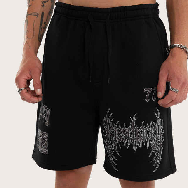 Model wears Threshold Trackshort Jet Black Trackshorts Black – image 5