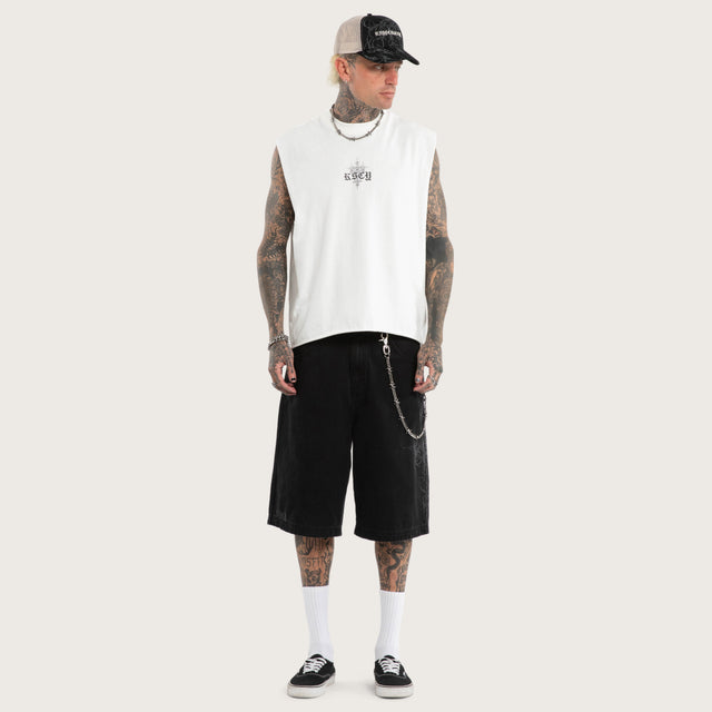 Model wears Luke Walker Tense K7 Super Baggy Jorts Black Shorts in Black - Image 5