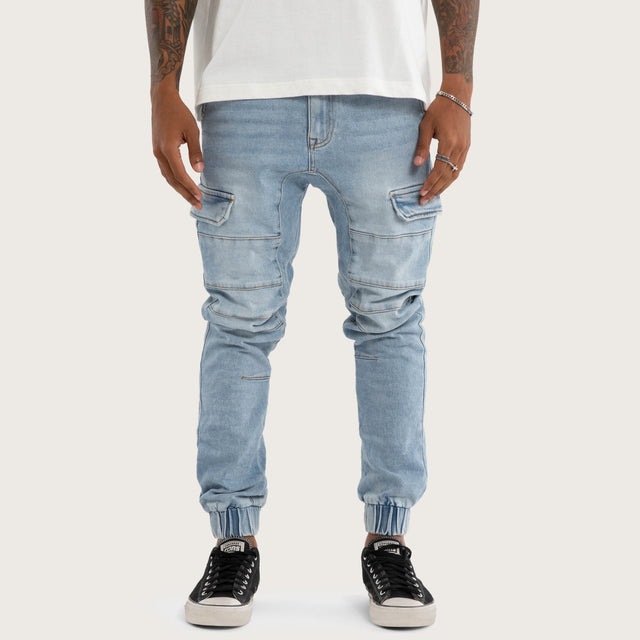 Model wears Salem Cargo Jogger Sunbleached Blue Pants in Blue - Image 3