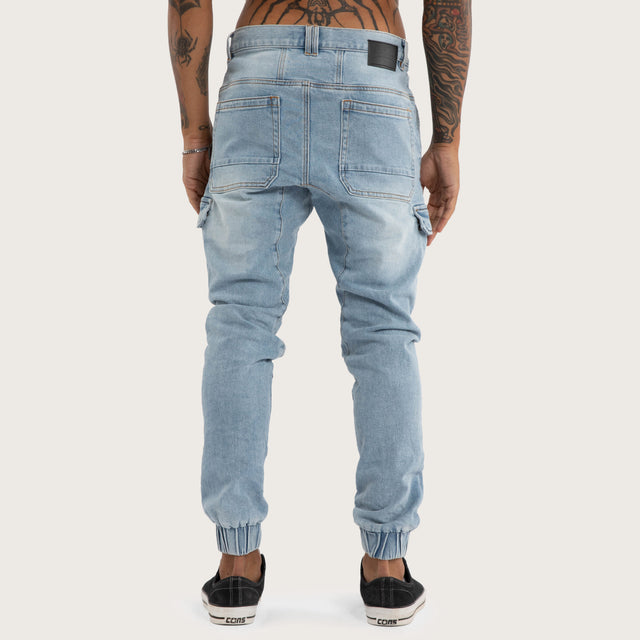 Model wears Salem Cargo Jogger Sunbleached Blue Pants in Blue - Image 4