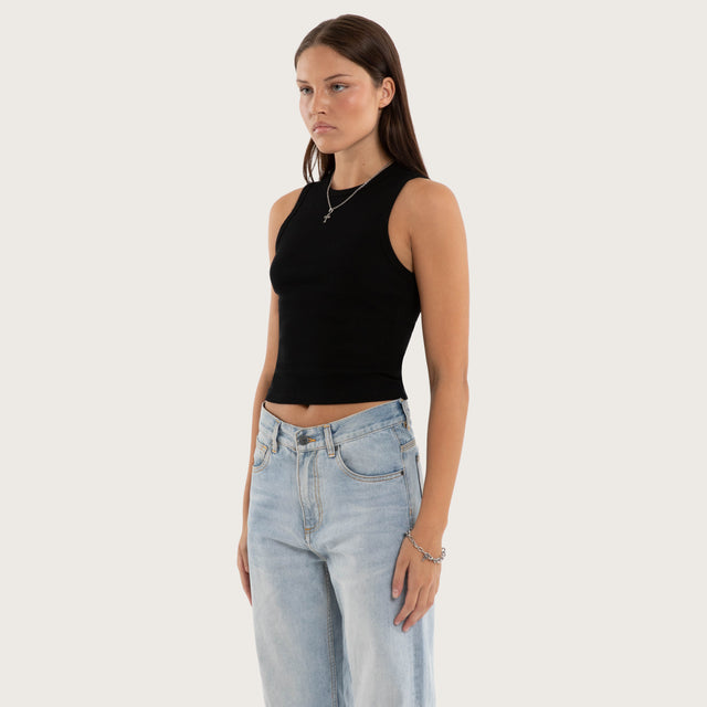 Model wears Marais Rib Tank Jet Black Tanks in Black - Image 3