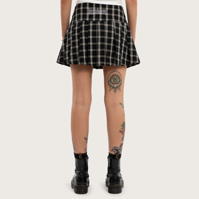 Model wears Tempest Pleated Skirt Black/White Check Skirt Black – image 2