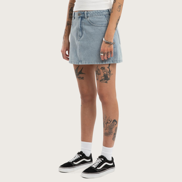 Model wears Ophelia Denim Skirt Washed Blue Skirt Blue – image 1