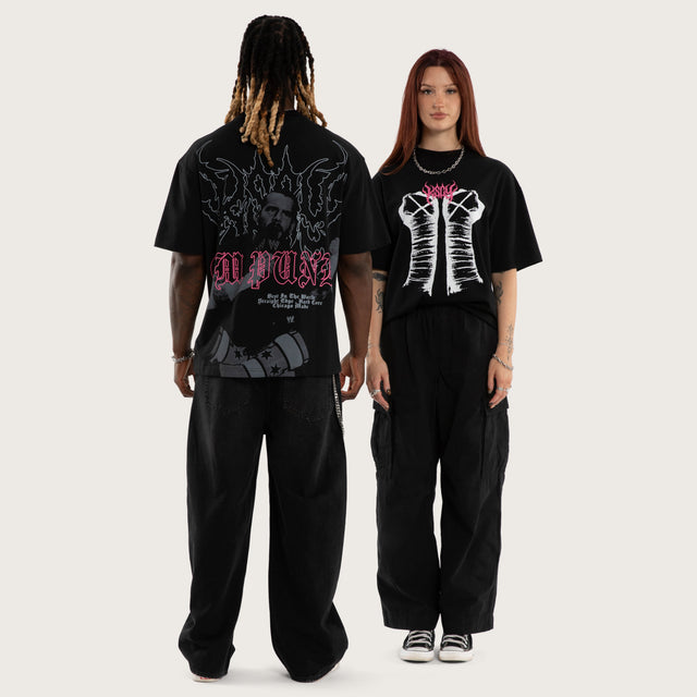 Model wears CM Pipe Bomb Street Tee Jet Black T-Shirts Black – image 5