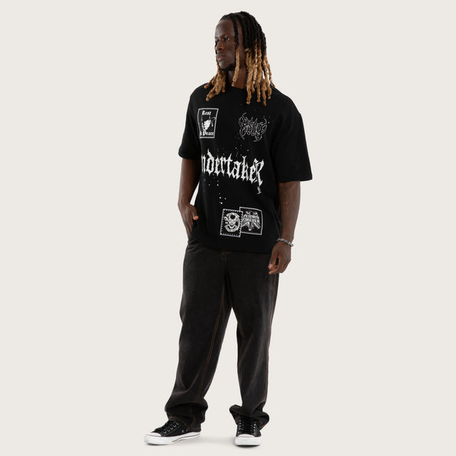 Model wears UT Casket Loopback Osized Tee Jet Black T-Shirts Black – image 2