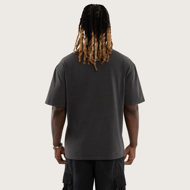 Model wears RO Tribal Street Tee Pigment Jet Black T-Shirts Black – image 2