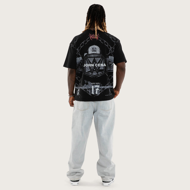 Model wears Cena Hustle Street Tee Jet Black T-Shirts Black – image 2