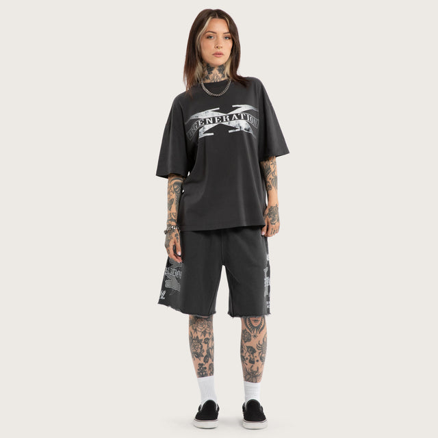 Model wears D-Generation X Loopback Trackshort Pigment Black Trackshorts Black – image 6